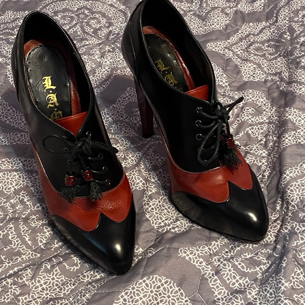 Black and red leather L.A.M.B. Leather booties